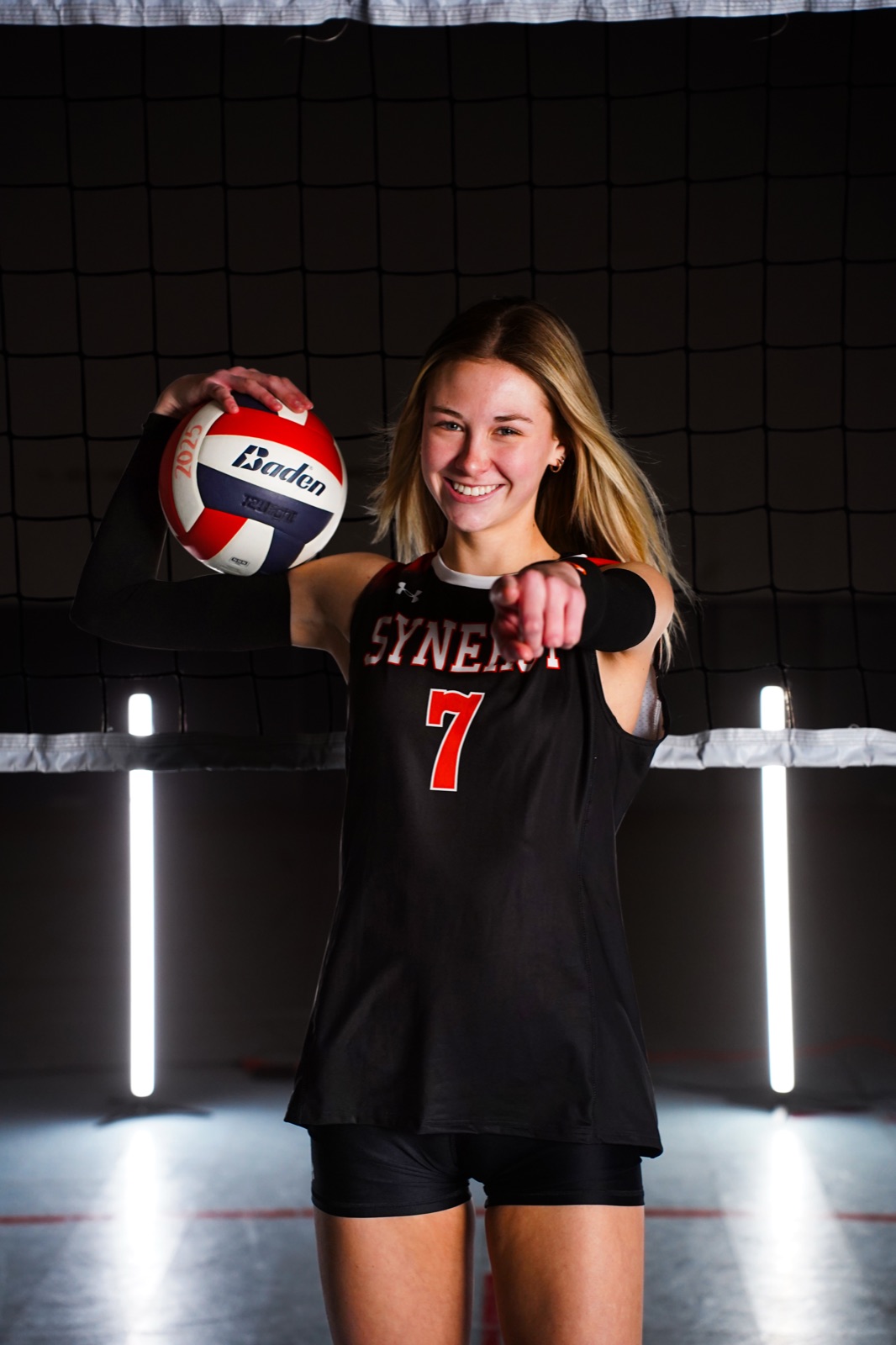 Athlete portrait under stadium-style lighting