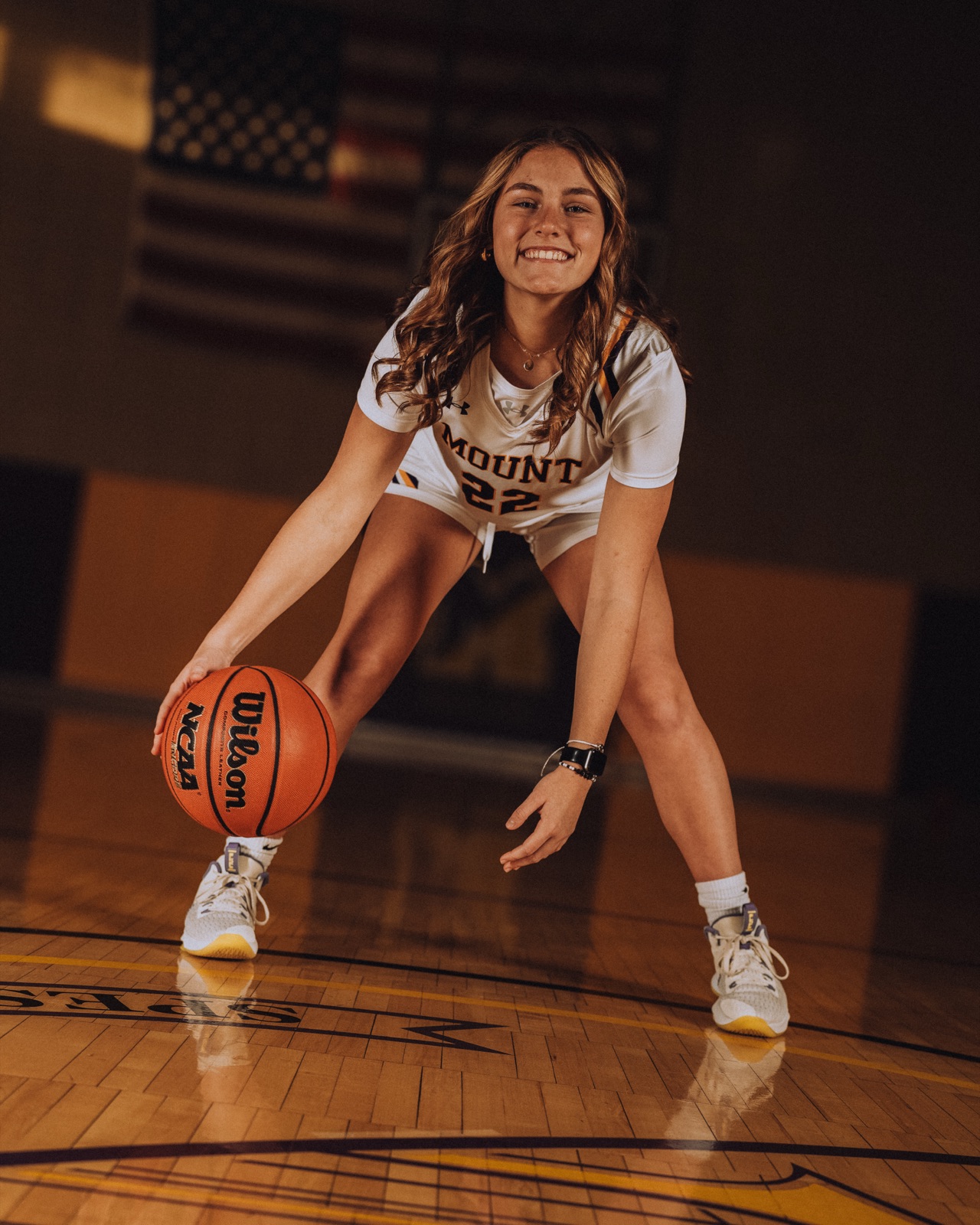 Athlete action portrait under dramatic lighting at a team media day